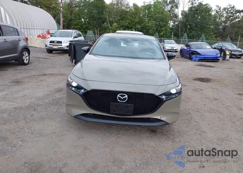 2024 Mazda Mazda3 Hatchback 2.5 Carbon Turbo from USA, damaged, VIN JM1BPBYY6R1704673